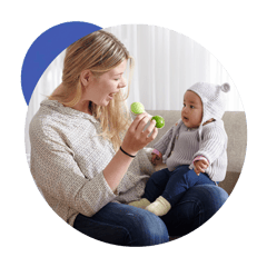 Babysitter playing with a toddler